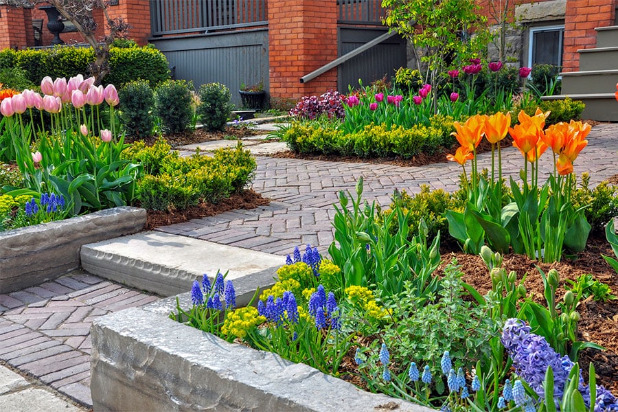 Hardscaping with brick pavers and flowers