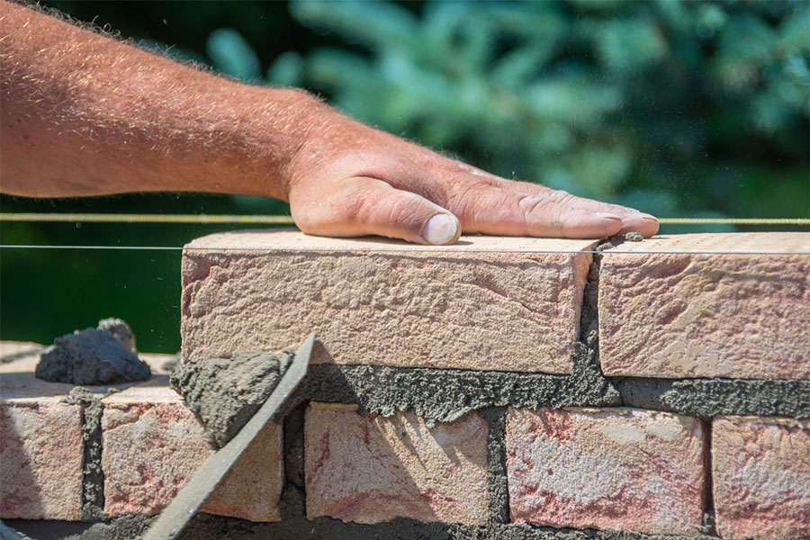 Michigan Masonry Contractor Laying Brick