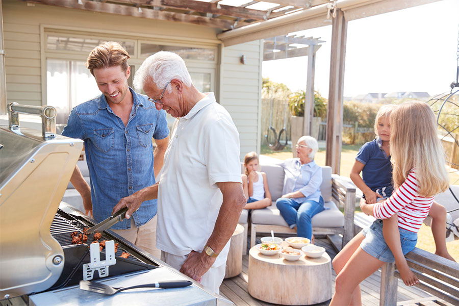Family cooking outside