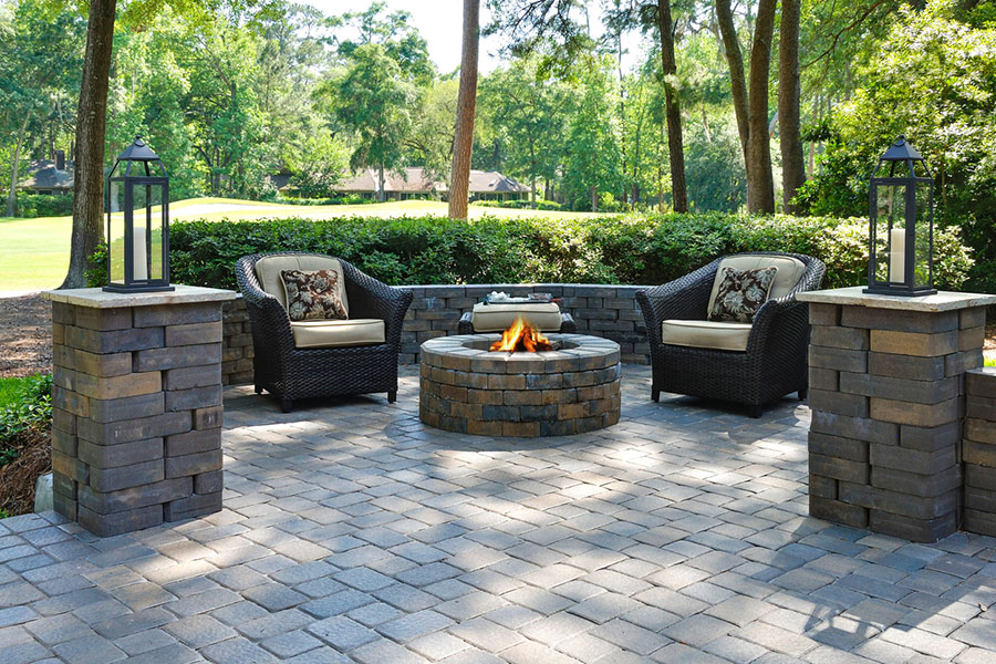 Creating a Cozy Backyard Retreat: The Role of Brick Fire Pits and Patios