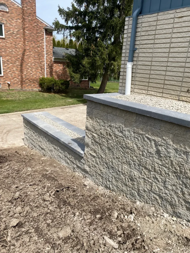 Block planter wall rebuild by the garage, completed by It's The Brick Guys in Metro Detroit (view 3)