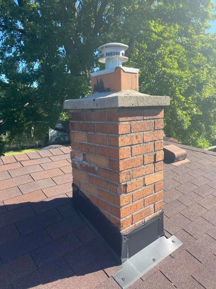 Before: brick chimney rebuild with new cap job before work started