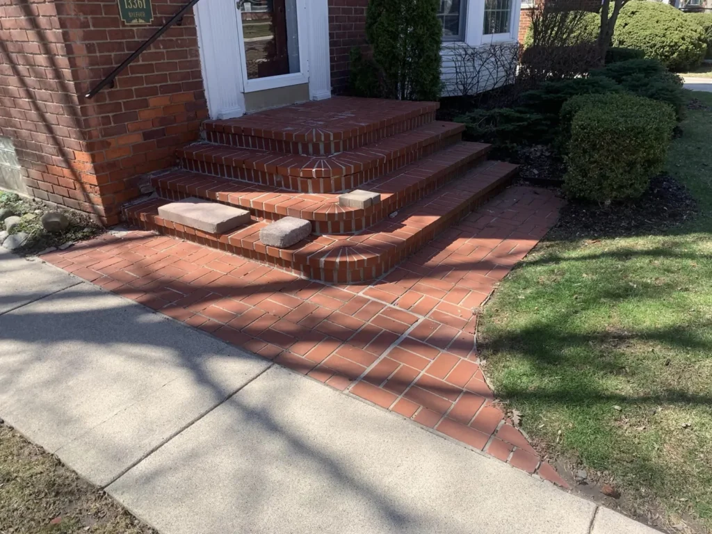 Before: brick front porch and steps rebuild job before work started