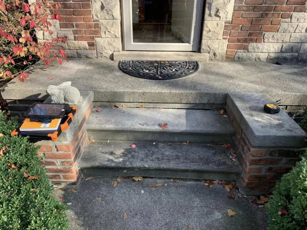 Before: brick front steps rebuilt with stone treads job before work started