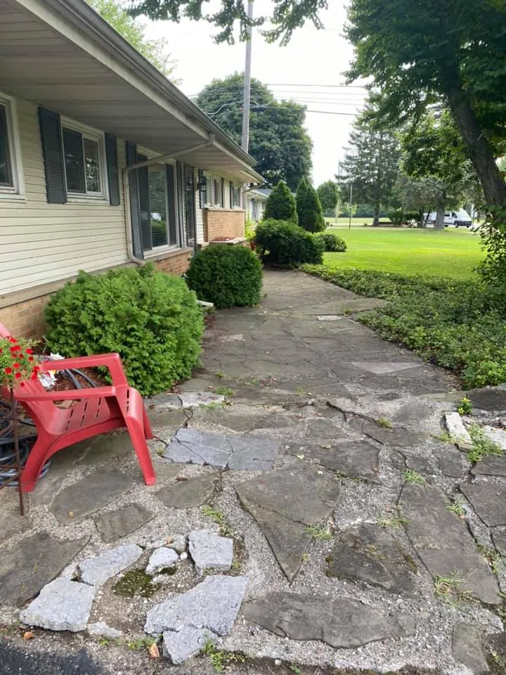 Before: brick paver walkway replacing flagstone job before work started
