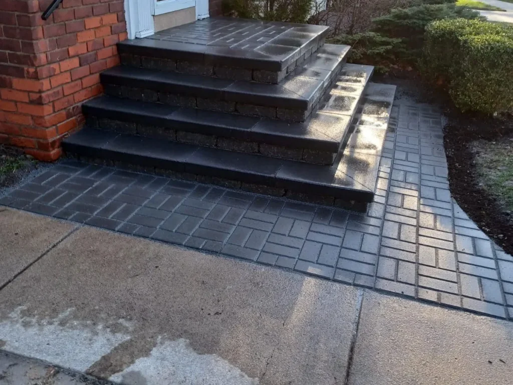 Charcoal paver steps and porch with a matching walkway in Warren, MI