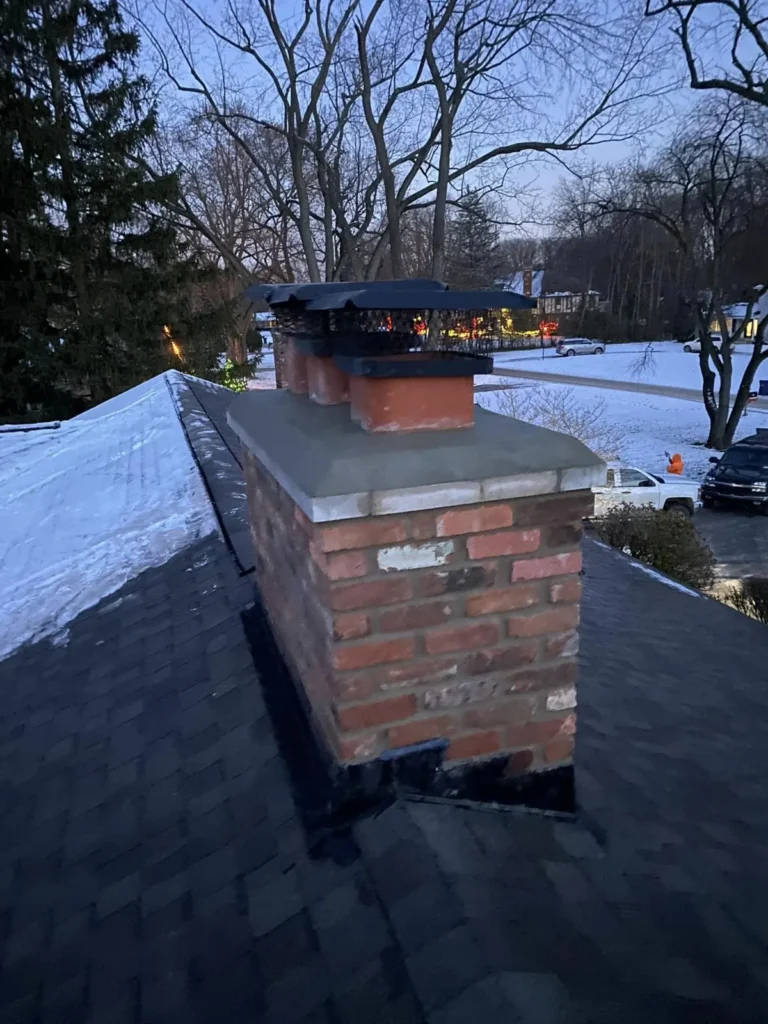 Chimney crown and brick repair, completed by It's The Brick Guys in Metro Detroit