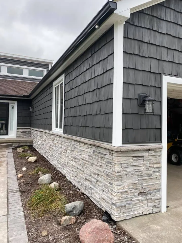 Cultured stone wainscot on a new home, completed by It's The Brick Guys in Metro Detroit (view 2)