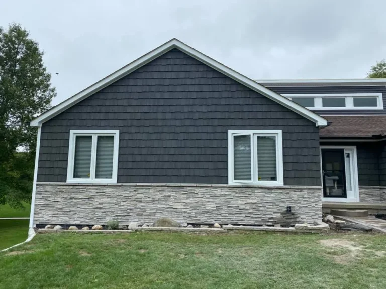 Cultured stone wainscot on a new home, completed by It's The Brick Guys in Metro Detroit (view 3)