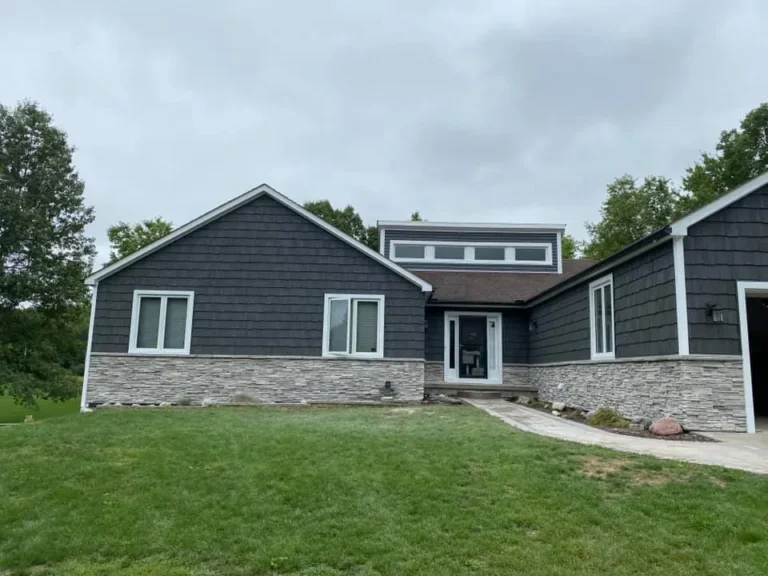 Cultured stone wainscot on a new home, completed by It's The Brick Guys in Metro Detroit (view 4)