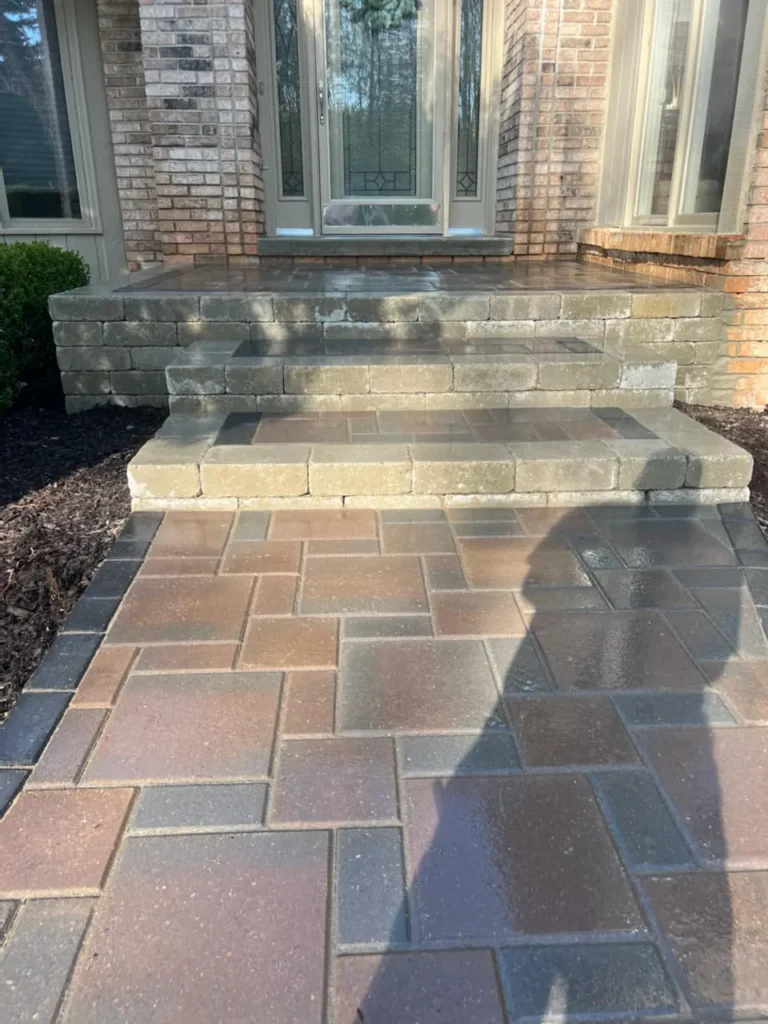 Curved red paver front walkway, completed by It's The Brick Guys in Birmingham, MI (view 6)