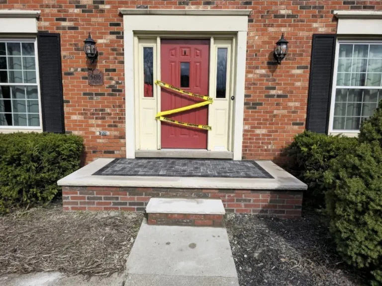 Front porch rebuilt with stone landing, completed by It's The Brick Guys in Metro Detroit