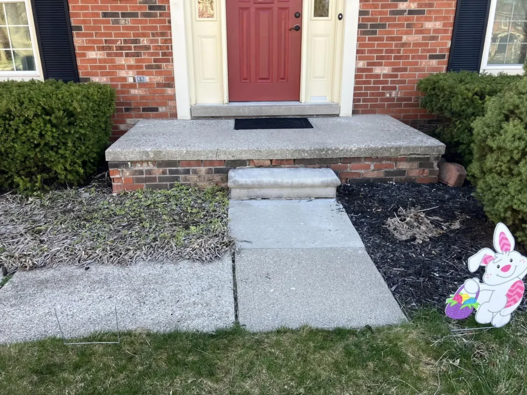 Before: front porch rebuilt with stone landing job before work started