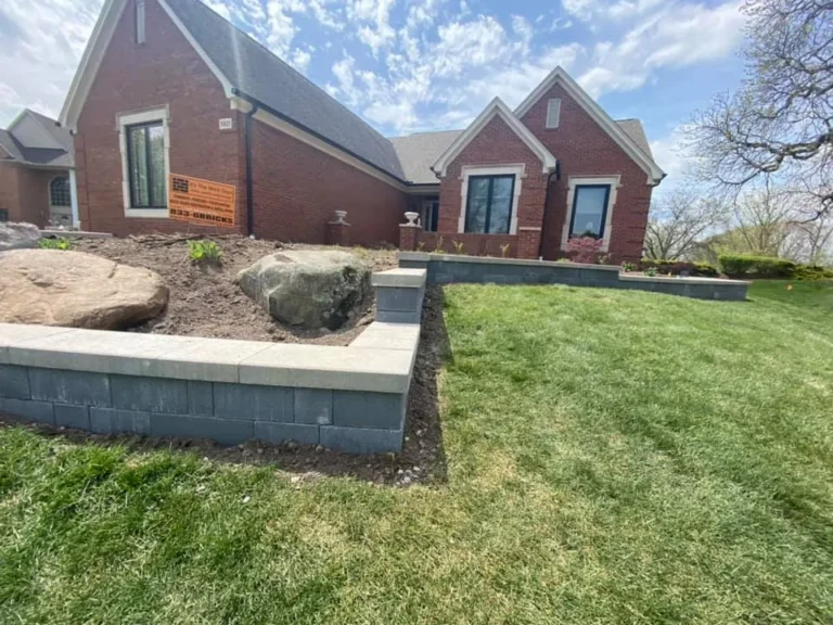 Front yard paver planter wall, completed by It's The Brick Guys in Metro Detroit