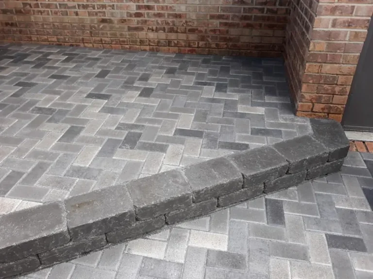 Gray paver front entrance landing, completed by It's The Brick Guys in Metro Detroit