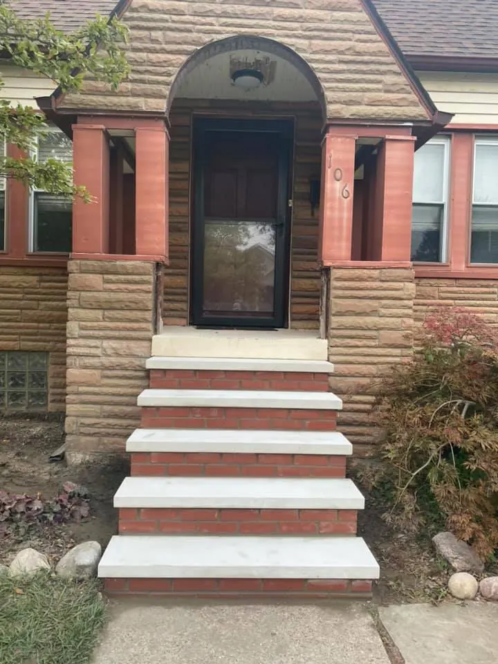 Limestone front steps, completed by It's The Brick Guys in Metro Detroit