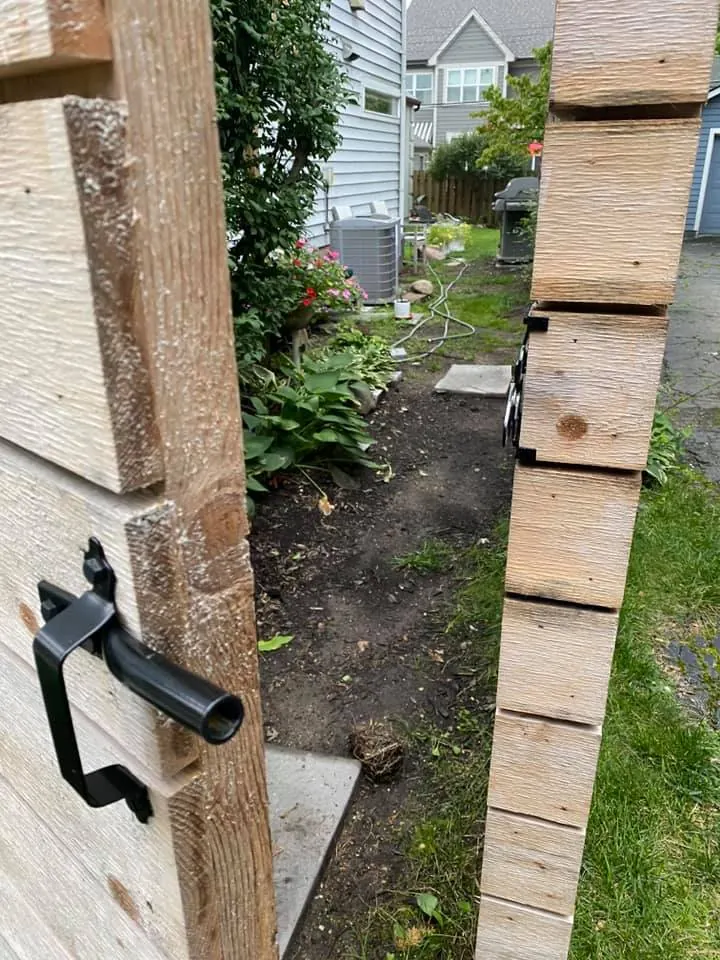 Before: narrow side-yard paver walkway job before work started