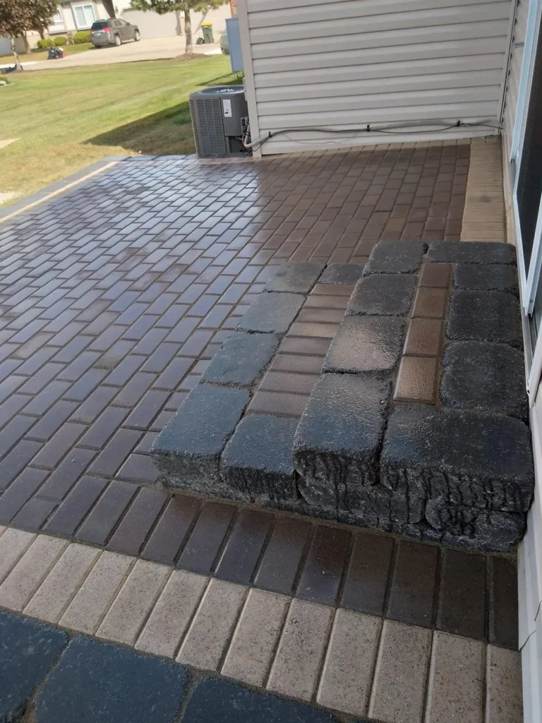 Paver patio replacement with border, completed by It's The Brick Guys in Metro Detroit