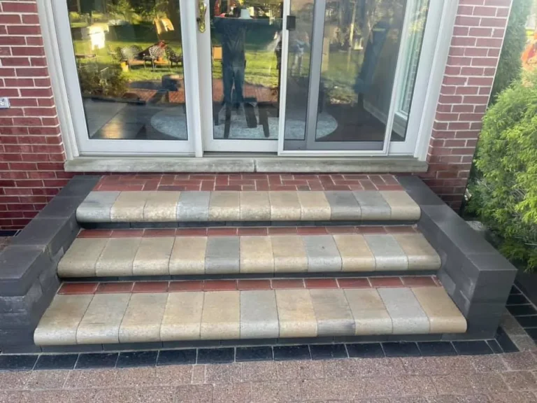 Paver patio with round fire pit, completed by It's The Brick Guys in Metro Detroit (view 9)