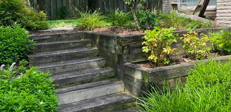 Old timber steps and retaining walls before replacement