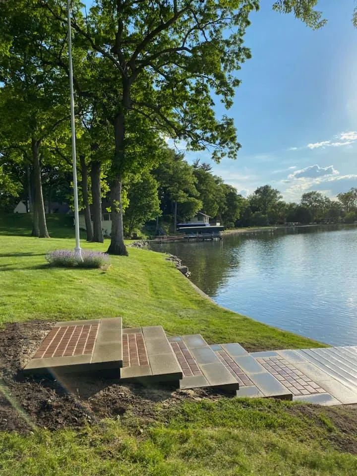 Paver steps with brick inlays to the dock, completed by It's The Brick Guys in Metro Detroit