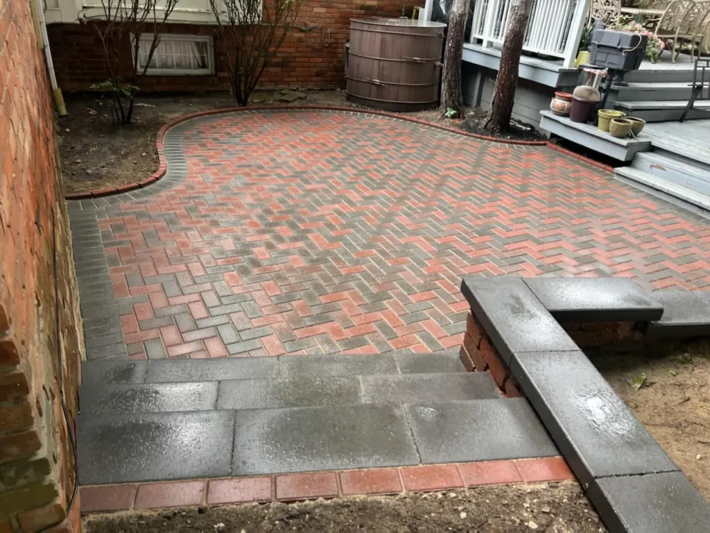 Red brick paver patio and steps, completed by It's The Brick Guys in Grosse Pointe, MI
