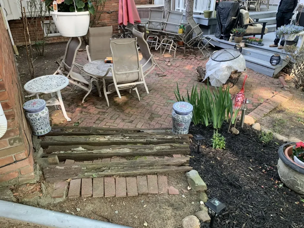Before: red brick paver patio and steps job before work started