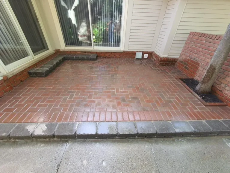 Red brick paver patio replacement, completed by It's The Brick Guys in Metro Detroit