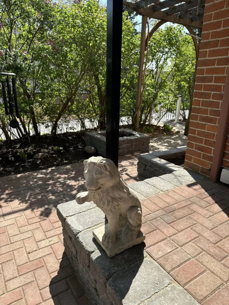 Red paver walkway and patio with pergola, completed by It's The Brick Guys in Metro Detroit (view 2)