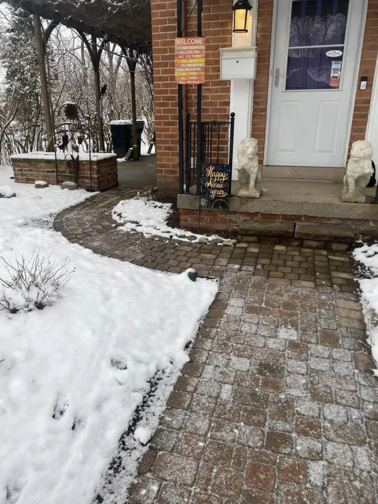 Before: red paver walkway and patio with pergola job before work started