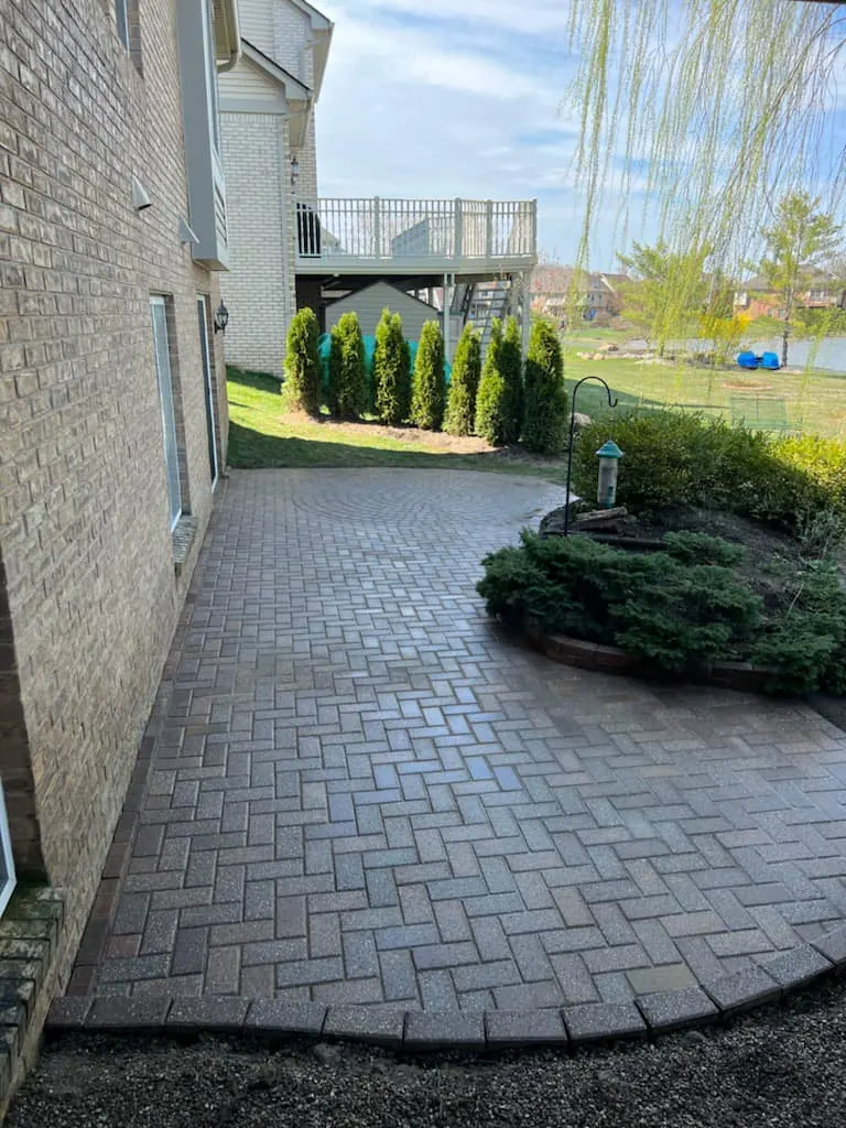 Side-yard paver patio restoration, completed by It's The Brick Guys in Sterling Heights, MI