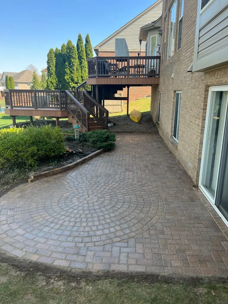 Side-yard paver patio restoration, completed by It's The Brick Guys in Sterling Heights, MI (view 2)