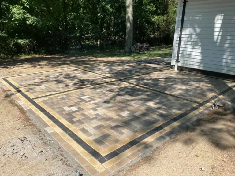 Tan and charcoal paver patio, completed by It's The Brick Guys in Metro Detroit