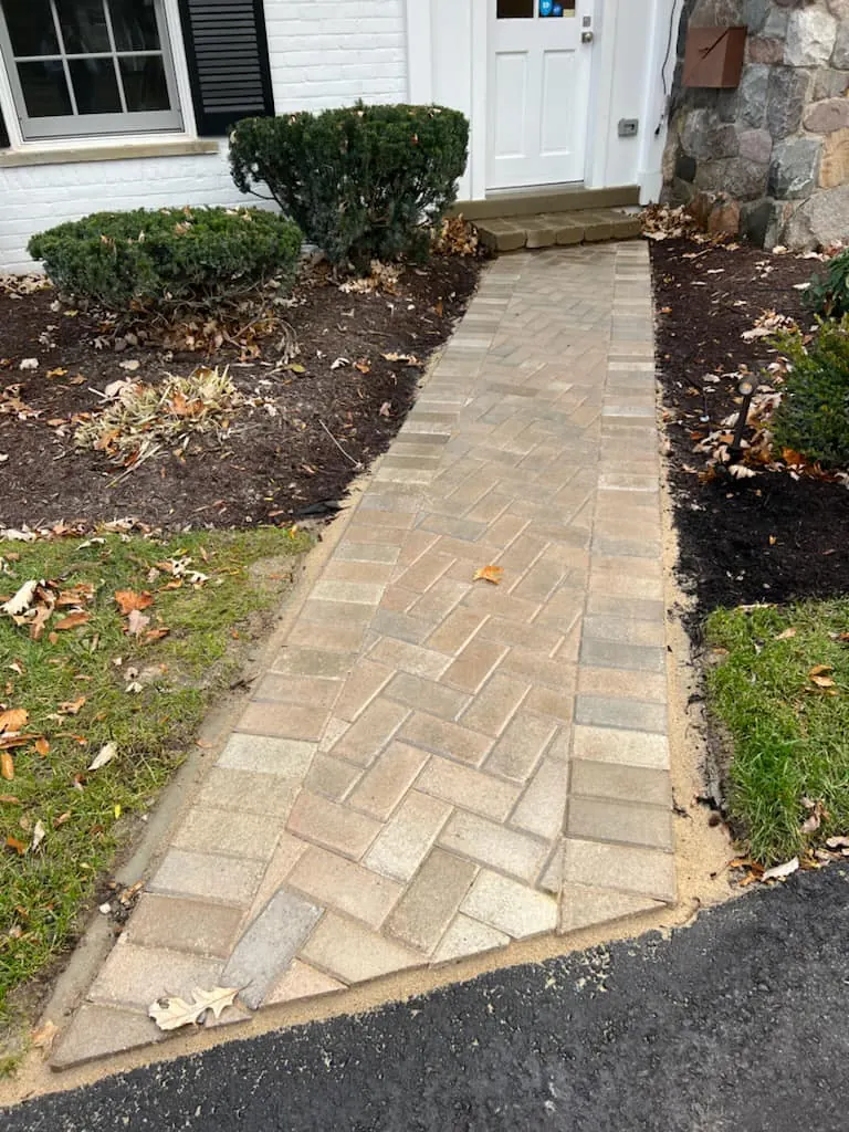 Tan herringbone walkway replacement, completed by It's The Brick Guys in Metro Detroit