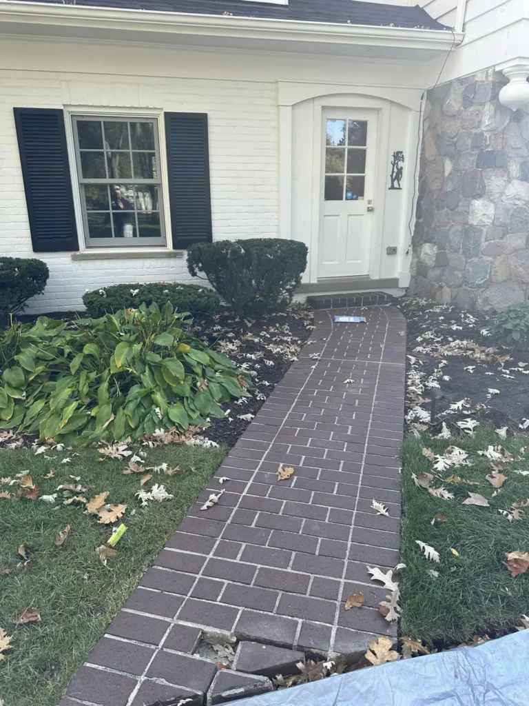 Before: tan herringbone walkway replacement job before work started