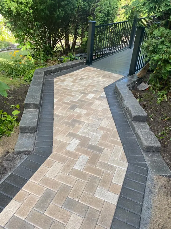 Tan paver walkway replacing concrete, completed by It's The Brick Guys in Metro Detroit